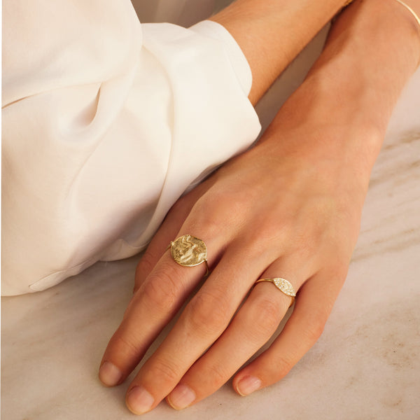Mini Greek d-eye ring gold and white diamonds